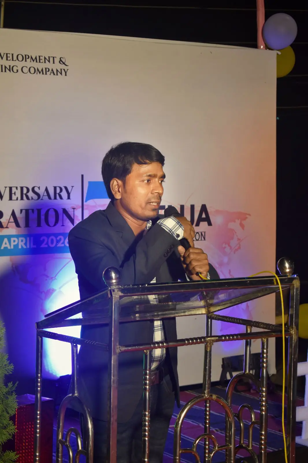 Safikul Islam speaking at a business event